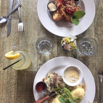 Cody's La Jolla - Top; french toast  Drink; lemon thyme spritzer ( would not rec) Bottom; grits, potatoes, and crab cake Benedict - Breakfast & Brunch Near Me - La Jolla, California