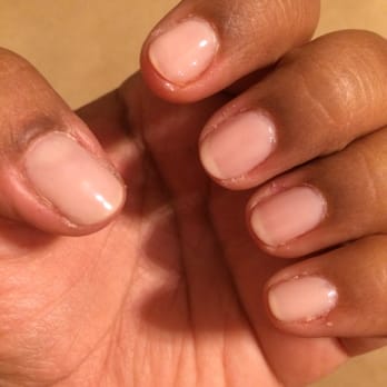 Lv Nails Spa - Bad manicure!  Look at the skin around the nail. The nails were not well painted, and they were filed unevenly. - Massage Near Me - Houston, Texas