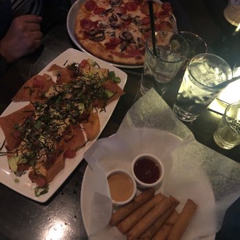 Yard House - Wonton poke nachos, pork lumpia and pepperoni mushroom pizza - New American Near Me - Riverside, California Yard House - Wonton poke nachos, pork lumpia and pepperoni mushroom pizza - New American Near Me - Riverside, California