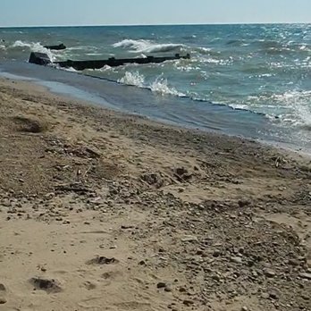 Lions Park Beach - Waves crash against the retaining wall bulwark where the sand has eroded. - Beaches Near Me - Saint Joseph, Michigan Lions Park Beach - Waves crash against the retaining wall bulwark where the sand has eroded. - Beaches Near Me - Saint Joseph, Michigan