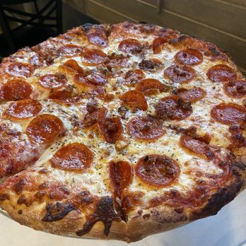 Stevarinos Italian Eatery & Pub - Pepperoni and sausage pizza - Italian Near Me - Chattanooga, Tennessee Stevarinos Italian Eatery & Pub - Pepperoni and sausage pizza - Italian Near Me - Chattanooga, Tennessee