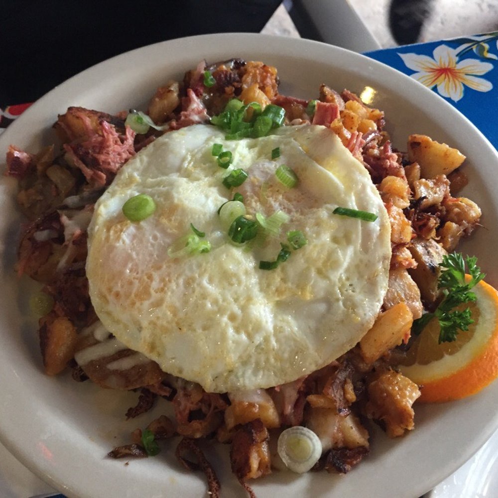 Beach Break Cafe - Corned beef hash with egg over easy. Before picture - Breakfast & Brunch Near Me - Oceanside, California