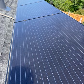 Edward’s Roofing - Dirty solar panels before cleaning. - Gutter Services Near Me - Bay Point, California