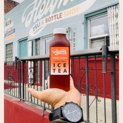 The Heights Deli & Bottle Shop - Peach Ice Tea. #TheHeights #HandModel