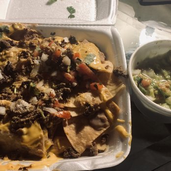 Costa Grande - Nachos/Asada, swimming in horrible liquid cheese sauce & side of watery guacamole. - Mexican Near Me - Van Nuys, California Costa Grande - Nachos/Asada, swimming in horrible liquid cheese sauce & side of watery guacamole. - Mexican Near Me - Van Nuys, California