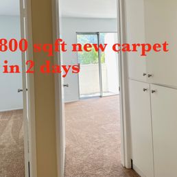 an empty room with a door open