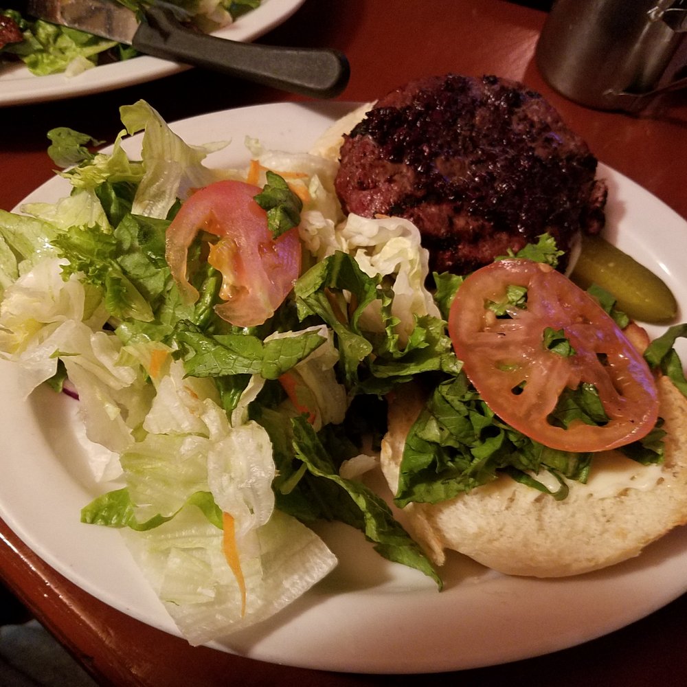 Moose's Down Under - Roo Burger with mixed greens - Pubs Near Me - Vancouver, British Columbia Moose's Down Under - Roo Burger with mixed greens - Pubs Near Me - Vancouver, British Columbia