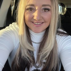 Creative Waves Salon - Peek a boo color, textured highlights, and framed face long layers.