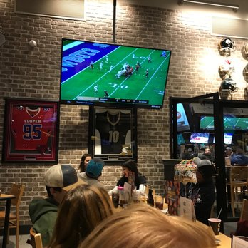 Buffalo Wild Wings - Well, we're still waiting on food. At least we can watch Texas high school football while we wait. - Sports Bars Near Me - Abilene, Texas