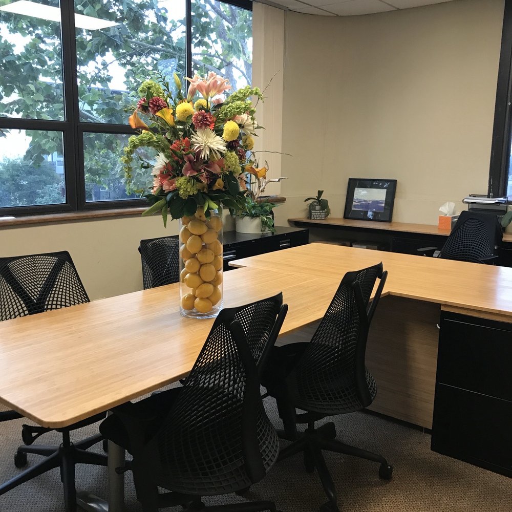 The Singing Orchid - The arrangement in the new office. - Florists Near Me