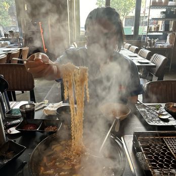 Origin Korean BBQ - Right when the waiter turned off the burner, all the smoke flared up lol. My wife was trying to show the ramen noodles. - Korean Near Me - Los Angeles, California Origin Korean BBQ - Right when the waiter turned off the burner, all the smoke flared up lol. My wife was trying to show the ramen noodles. - Korean Near Me - Los Angeles, California