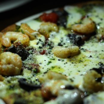 Aster Cafe - Shrimp and Arugula-Walnut Pesto Flatbread. - New American Near Me - Minneapolis, Minnesota Aster Cafe - Shrimp and Arugula-Walnut Pesto Flatbread. - New American Near Me - Minneapolis, Minnesota