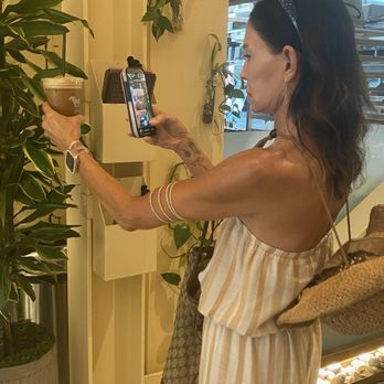 Onyx Coffee Lab - Me concentrating on taking the perfect yelp pic - - Coffee & Tea Near Me - Springdale, Arkansas