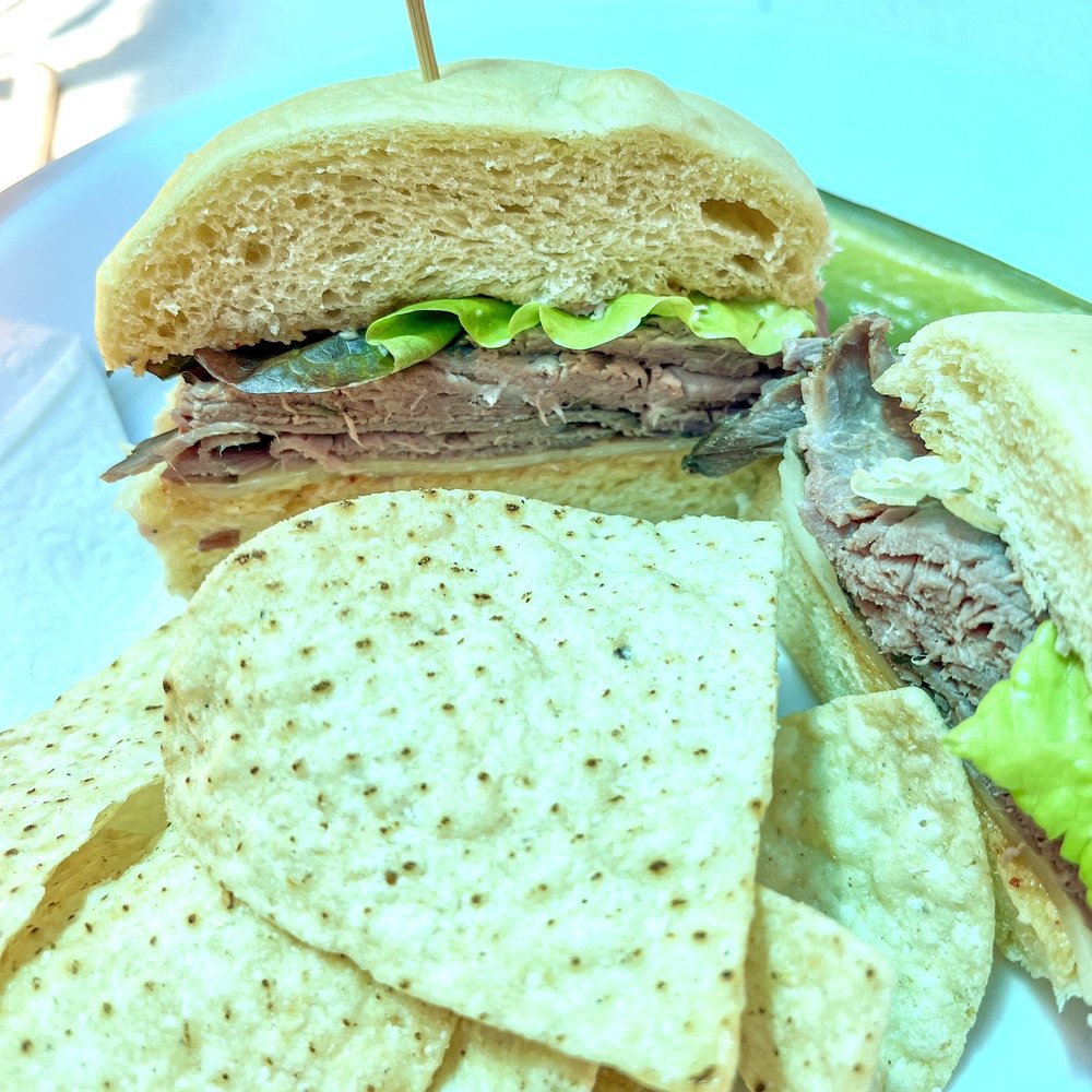 Sammy sandwich with chips and spicy pickle Sammy sandwich with chips and spicy pickle