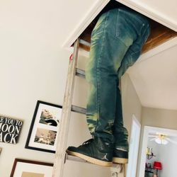 Innovative Home Concepts - Inspecting the underside of a roof deck.