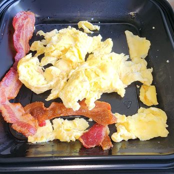 Broken Yolk Cafe - Combo to the cruncy french toast. Eggs and bacon - Breakfast & Brunch Near Me - Irvine, California Broken Yolk Cafe - Combo to the cruncy french toast. Eggs and bacon - Breakfast & Brunch Near Me - Irvine, California