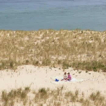 Chatham Lighthouse Beach - A couple getting engaged in May 2014.  Romantic! :) - Beaches Near Me - Chatham, Massachusetts