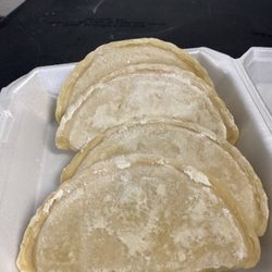 Empanadas Gourmet - I bought these frozen so I can pop them in the oven any time. They sell them piping hot also.