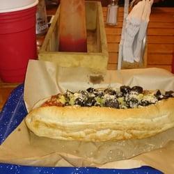 Hot Dog Ramírez - Vegetariano con salsa italiana y pan de ajonjolí.