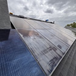 Soapy Solar - This is the before, and you can see overspray also from when they painted the chimney