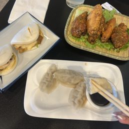 Pork Dumpling (5 pc) Grilled Pork Bun (2 pc) Spicy Lemongrass Wings (6) Pork Dumpling (5 pc) Grilled Pork Bun (2 pc) Spicy Lemongrass Wings (6)