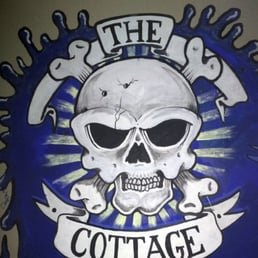 Logo and wall-art at The Cottage Logo and wall-art at The Cottage