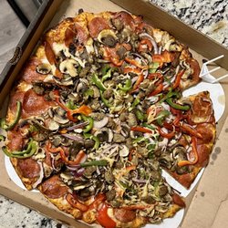 Abby's Legendary Pizza - Wowza!  The amount of delectable, fresh toppings on a perfectly pizza oven charred crisp crust - I can't believe this is Florence, OR?!