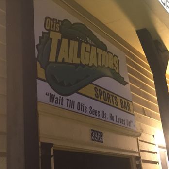 Tailgators - a sign for tailgators on the side of a building - Sports Bars Near Me - Cedar Rapids, Iowa