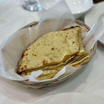 Kitchen 58 - Aloo Paratha - freshly baked whole wheat bread stuffed with potatoes and cilantro - Halal Near Me - Woodside, New York Kitchen 58 - Aloo Paratha - freshly baked whole wheat bread stuffed with potatoes and cilantro - Halal Near Me - Woodside, New York