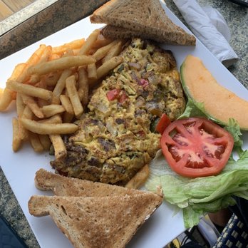 The Dune Deck Cafe - Steak and eggs omelette - Breakfast & Brunch Near Me - Lantana, Florida The Dune Deck Cafe - Steak and eggs omelette - Breakfast & Brunch Near Me - Lantana, Florida