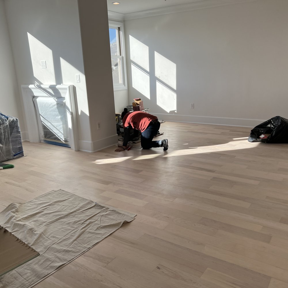 TS Construction - This is a photo of one of their workers touching up one the baseboards of my living room. There are so neat! - General Contractors Near Me - Tarzana, California
