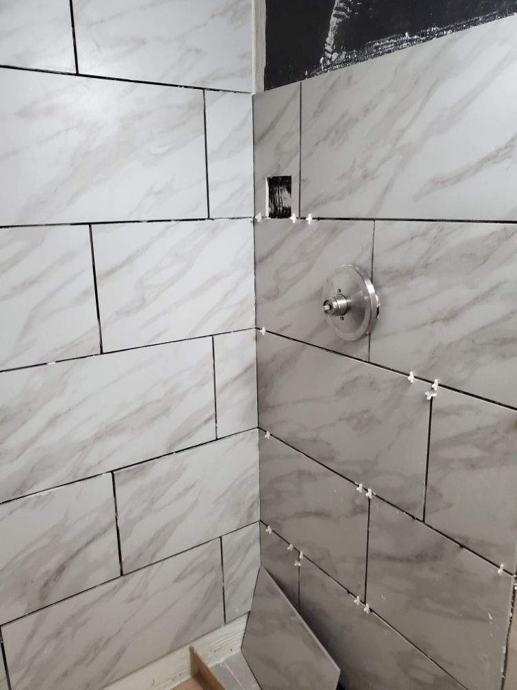 Slide of Powell's Roofing & Remodeling