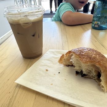Seven Syllables Coffee - Iced Oat milk Maple Latte with Chocolate Croissant - Coffee Roasteries Near Me - Cerritos, California Seven Syllables Coffee - Iced Oat milk Maple Latte with Chocolate Croissant - Coffee Roasteries Near Me - Cerritos, California