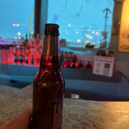 Angry Orchard and the glass view behind the bar Angry Orchard and the glass view behind the bar