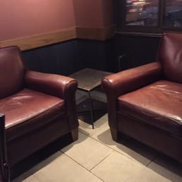two leather chairs facing each other