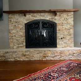 New fireplace remodel with new door.