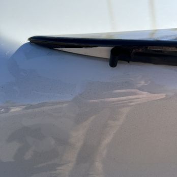 Tint World - Spoiler wrap tear - Car Window Tinting Near Me - Scottsdale, Arizona Tint World - Spoiler wrap tear - Car Window Tinting Near Me - Scottsdale, Arizona