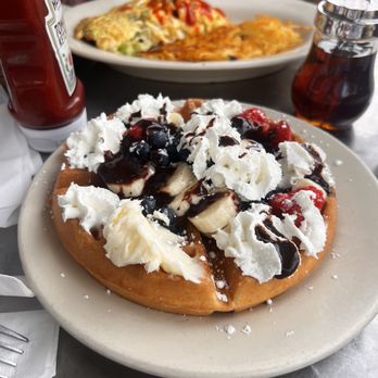 Eddie's Cafe - Belgian waffle with fruits, chocolate syrup, and whipped cream - Breakfast & Brunch Near Me - San Francisco, California Eddie's Cafe - Belgian waffle with fruits, chocolate syrup, and whipped cream - Breakfast & Brunch Near Me - San Francisco, California