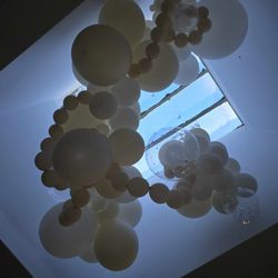 Ballooniverse By Jennifer - this pic does not do justice its so beautiful and it swags about 20 feet on its way down! and had mini pearls on the clear balloons
