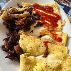 Souderton Family Restaurant - Undercooked Cheese omelet (which I didn't know was possible) with "crispy" home fries? Aka blackened beyond belief.