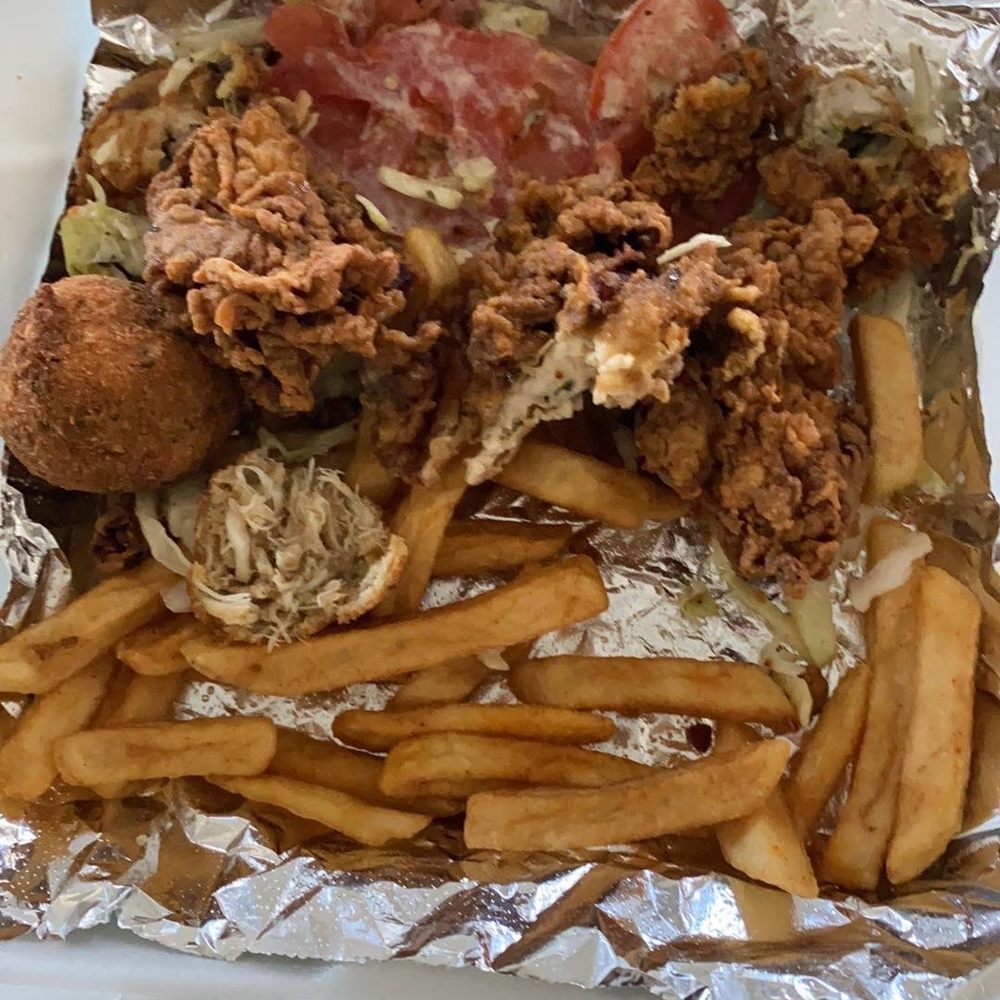 Fish Cage - Oyster Po Boy (SO MUCH & SO BIG) and Seasoned Fries and Crab Balls - Seafood Near Me - North Las Vegas, Nevada Fish Cage - Oyster Po Boy (SO MUCH & SO BIG) and Seasoned Fries and Crab Balls - Seafood Near Me - North Las Vegas, Nevada