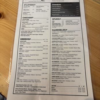 Wicked Slice - Menu - front - The Wicked Slice menu displays a variety of food options including starters such as zucchini fries, fried mozzarella, and fried pickles. It offers salads like house salad, Caesar, Greek, and others. The menu features numerous pizza choices, including chicken parmesan, eggplant parmesan, and specialty options like mac and cheese and buffalo chicken. Sandwiches include chicken bacon ranch, turkey bacon, and the cutlet. Prices are listed for each item, with options for dine-in or take-out. The menu also provides additional charges for extras like bacon, avocado, and extra cheese. - Pizza Near Me - Coventry, Connecticut