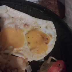 Waffle House - Over cooked Sunnyside up eggs and burned hashbrowns