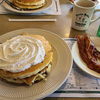 Uncle Bill's Pancake House - Chocolate Chip pancakes topped with whipped cream and a side of bacon with a cup of coffee - Breakfast & Brunch Near Me - Cape May, New Jersey Uncle Bill's Pancake House - Chocolate Chip pancakes topped with whipped cream and a side of bacon with a cup of coffee - Breakfast & Brunch Near Me - Cape May, New Jersey