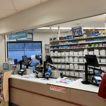 Walgreens - a man at a cash register - Drugstores Near Me - Middletown, Kentucky