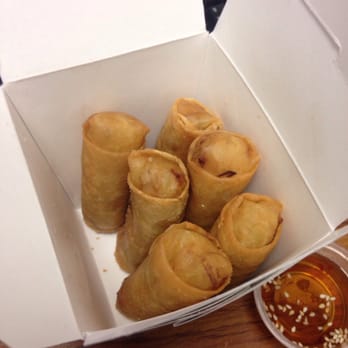 Araya's Place - Spring rolls, standing at attention in the takeout box - Thai Near Me - Seattle, Washington Araya's Place - Spring rolls, standing at attention in the takeout box - Thai Near Me - Seattle, Washington