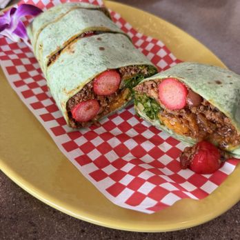 Splash Bar - Okidog. Hot dogs, pork belly, lettuce, chili, cheese, in a spinach tortilla. - Asian Fusion Near Me - Honolulu, Hawaii Splash Bar - Okidog. Hot dogs, pork belly, lettuce, chili, cheese, in a spinach tortilla. - Asian Fusion Near Me - Honolulu, Hawaii