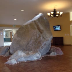 Knolls West Convalescent Hospital - Lobby of Knolls West. A large boulder is the focal point.