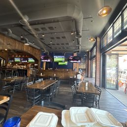 Outside dinning, big TV's and a gorgeous bar.