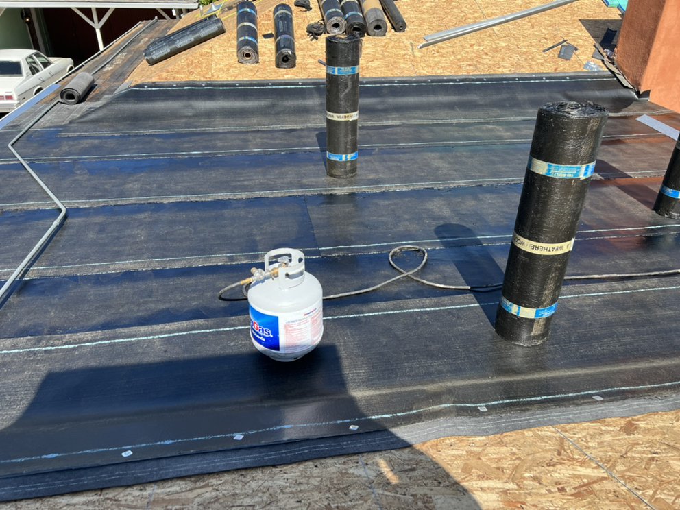 Slide of RRR Roofing